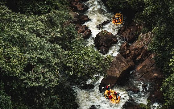 A group goes down a series of whitewater rapids on the Snake River in Jackson Hole