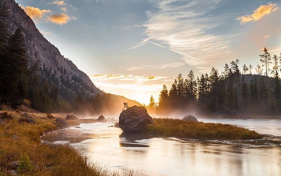 A sunrise photo of the Snake River in Jackson Hole